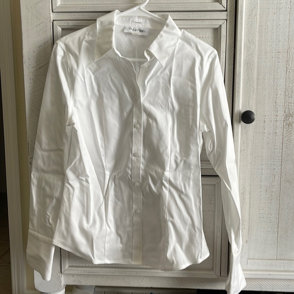 Calvin Klein button up top!